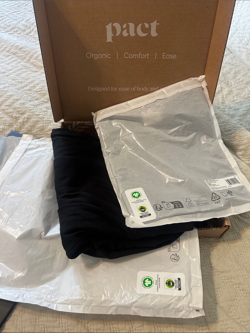 Pact Women’s black travel set- shirt and pull-on pants - top never opened.